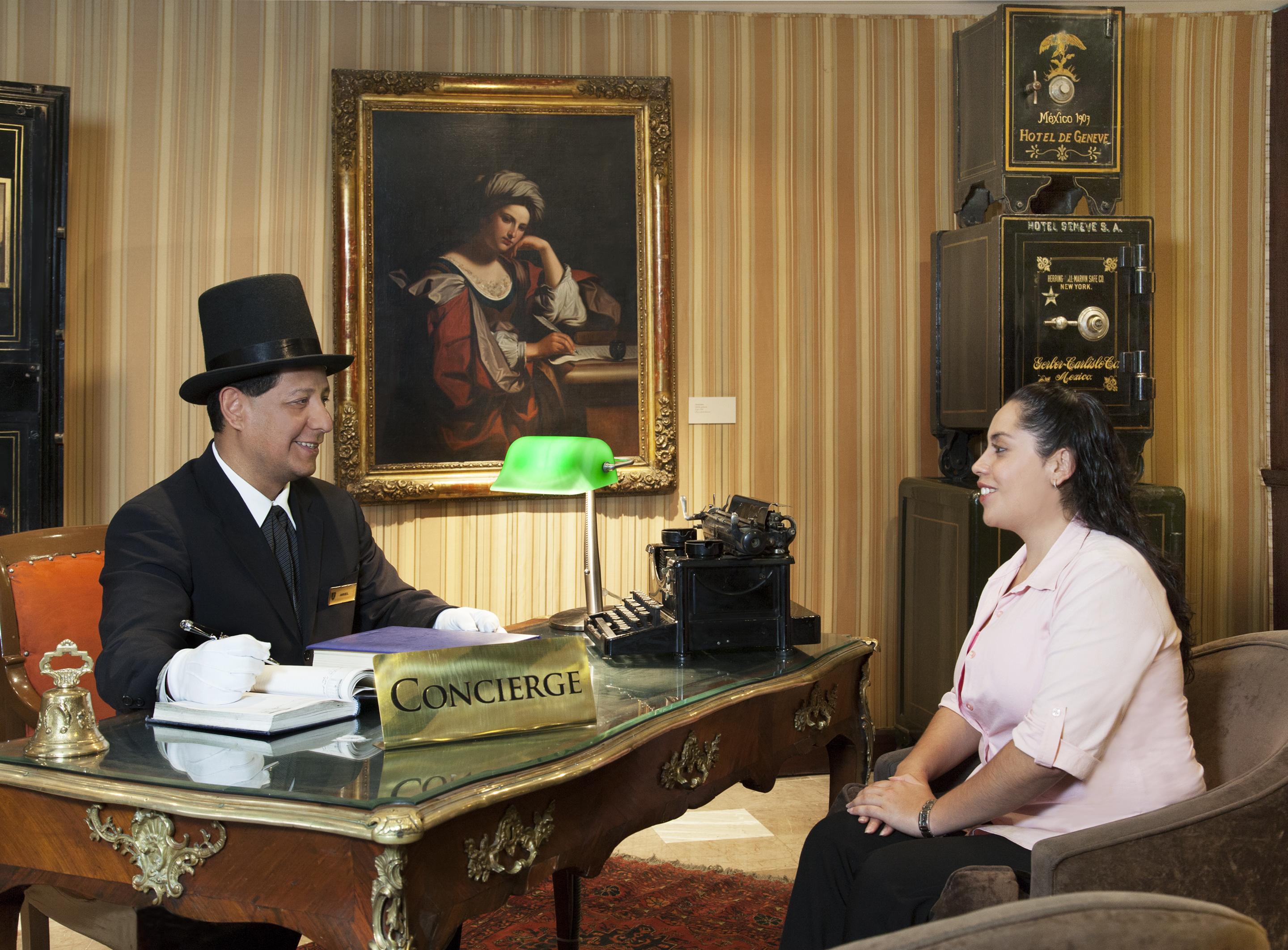 Hotel Geneve Cd De Mexico Eksteriør billede A concierge assisting a guest
